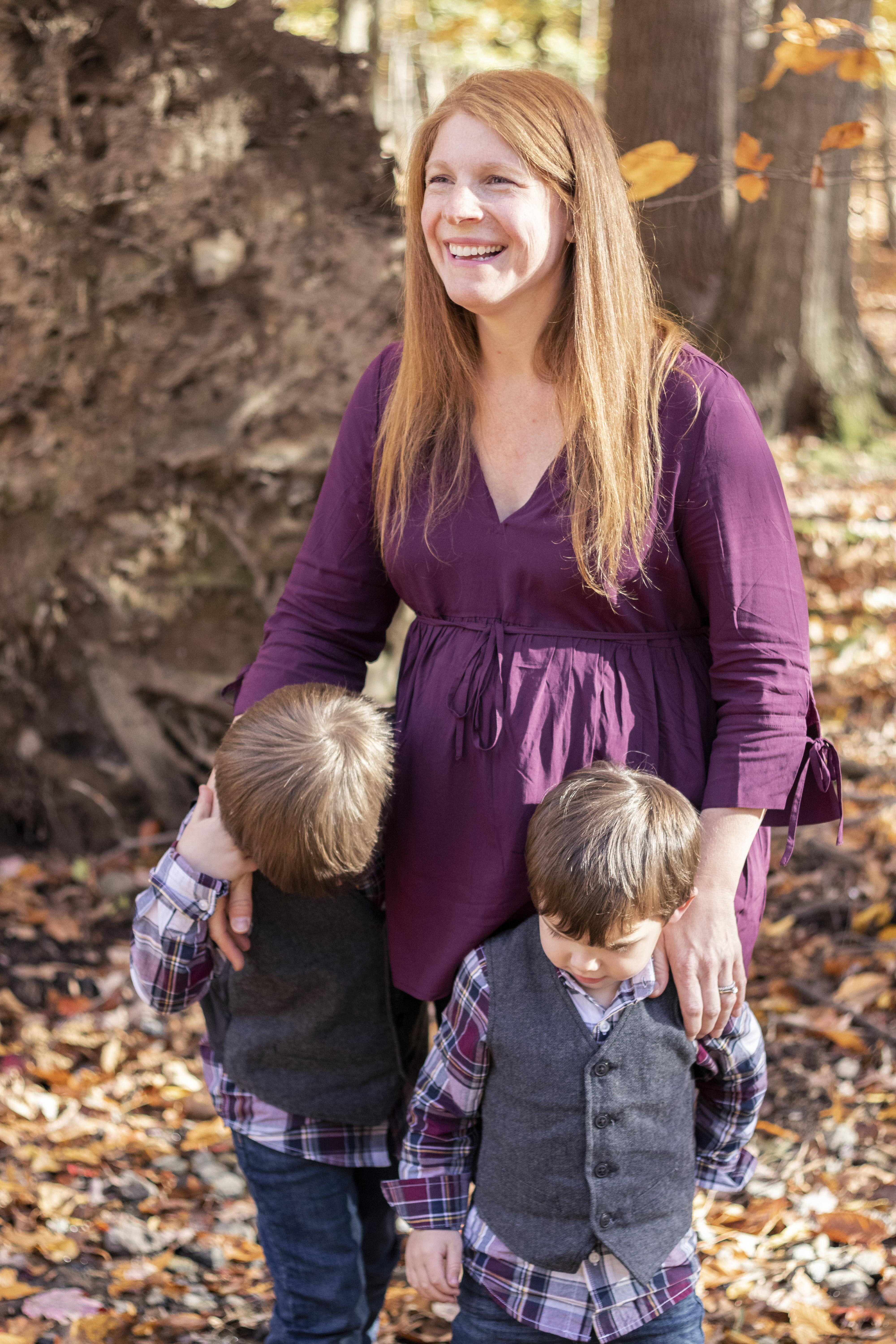Fall Family Portrait of young boys hugging and kissing pregnant mother's belly in Hillsdale, New Jersey by Jaimee Rae Photography